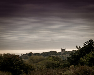 Low clouds and church in the distance
