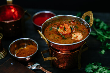 Indian curry soup in a copper plate