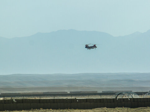 Old armoured vehicles military escorts, guns and tanks in Gardez in Afghanistan
