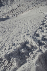 Fototapeta premium Winter landscape, mountains peaks covered by snow and rocks