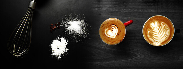 top of cup of hot coffee whisk sugar and white flour food and drink on black background