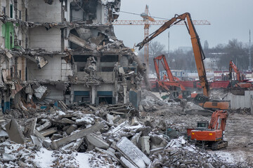 Demolition of an old industrial building in Moscow on a cloudy winter day