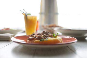 Beef stroganoff on a plate on vintage