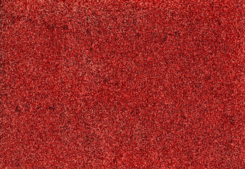 Fototapeta premium Red glitter texture abstract background. Shiny glowing colors. Concept of holidays, invitation, christmas or party.