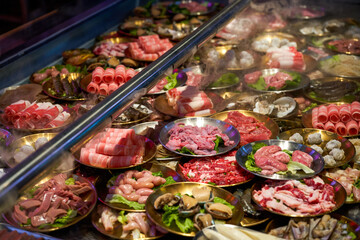 Fototapeta premium Fresh hot pot, rich and varied hot pot dishes