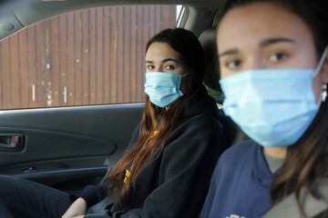 Fototapeta na wymiar girls with mask as protection against virus