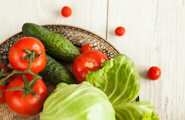 Healthy food concept. Fresh vegetables on a white wooden background. Healthy eating. View from above. Copy space.