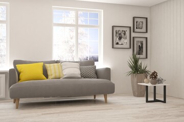 White living room with sofa and winter landscape in window. Scandinavian interior design. 3D illustration
