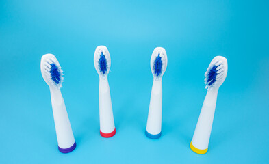 Toothbrush heads isolated on blue background.