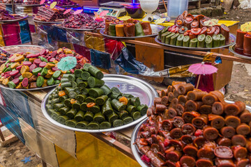 Dried fruit rolls for sale on the way to Rudkhan castle in Iran