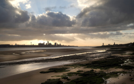 Low tide on a Merseyside beach, Liverpool, England, UK