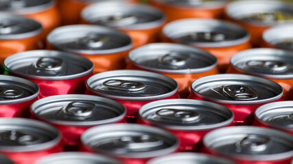 Colorful drink cans, close-up. Shallow depth of field.