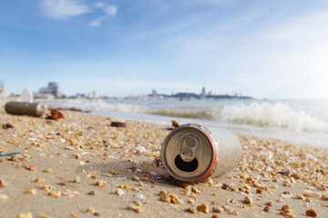 Beverage cans - garbage that was thrown on the beach. 