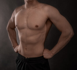 a guy with an athletic figure, with a naked torso unrecognizable