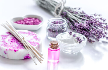 Fototapeta na wymiar natural herb cosmetic with lavender flowers flatlay on white background