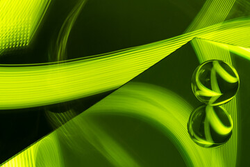 Glass crystal ball with a lime green pattern light painting fractals