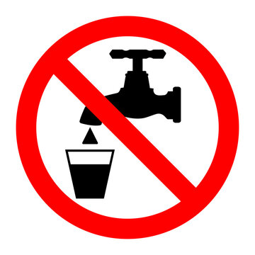 Not drinkable water sign. Red prohibition of taking water in the faucet.