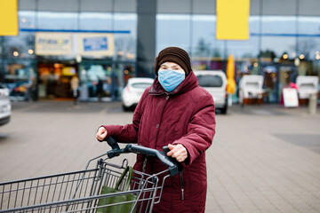 Old senior woman wear medical mask, protection against pandemic coronavirus disease. 90 years...