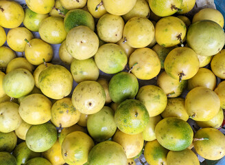 fresh yellow passion fruits on the stall for sale