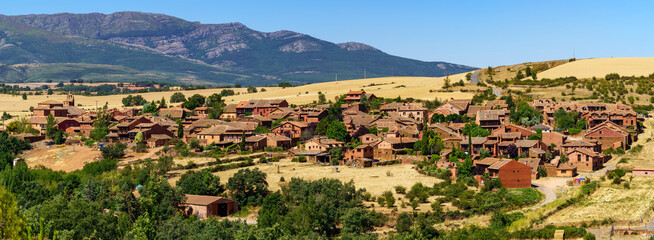 Aerial view medieval village in the mountains called Madriguera in Segovia Spain.
