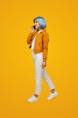 Fototapeta premium Stylish woman speaking on smartphone