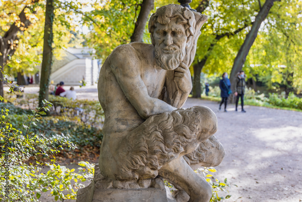 Poster Satyr sculpture in Royal Baths Park, Lazienki Park, one of the most famous parks in Warsaw, Poland