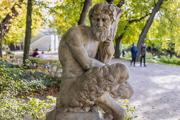 Satyr sculpture in Royal Baths Park, Lazienki Park, one of the most famous parks in Warsaw, Poland