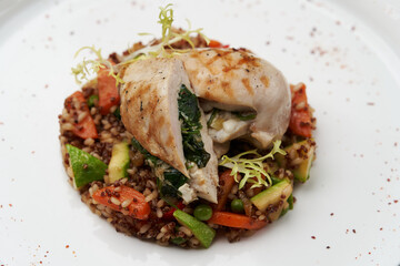 Baked chicken breast with quinoa rice. Healthy food