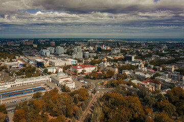 Fototapeta premium Air panorama Odessa Ukraine with Main train station and urbane landscape. Drone footage, sunny-day and cloudy sky.