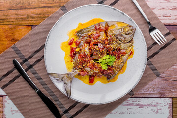 Deep fried pomfret fish and chili sauce