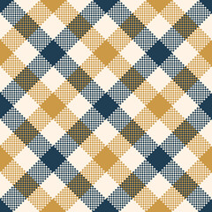 Gingham plaid pattern in blue and gold. Pixel vichy diagonal check plaid graphic for shirt, dress, skirt, tablecloth, or other modern spring, summer, autumn textile print.