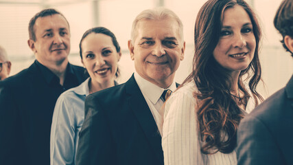 group of employees people standing in a row