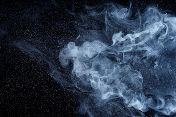 Abstract white smoke moves on black background. Beautiful swirling gray smoke.