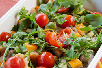 Italian Food, a salad mix with tomatoes and surimi