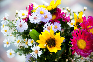 .fresh, variegated bright, multi-colored bouquet of wild and garden flowers.