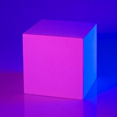 Gypsum cube in pink and blue neon light