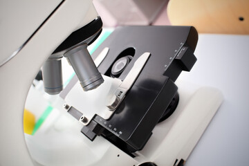 Miscoscope on the table in the scientific lab
