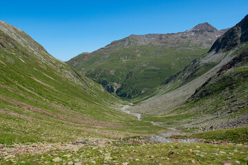 View into a typical trough valley in the Grisons mountains, Switzerland © Thomas