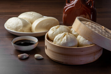 Chinese breakfast. Steamed buns and porridge are on the table