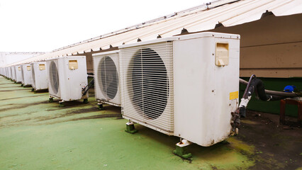 Compressor air conditioners on office buildings Installed in an orderly manner.
