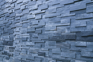 Pieces of stone wall, for background or texture , pattern gray of modern style design , real stone wall with black. 