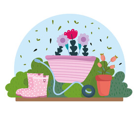 Gardening, wheelbarrow with flowers pot boots bushes nature