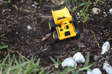toy truck on the dirt ground