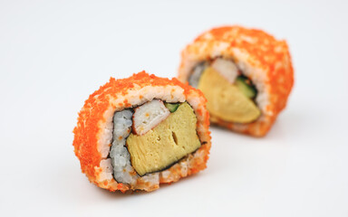 Sushi rolls japanese food isolated on white background. California Sushi roll with tuna, vegetables and unagi sauce closeup. Japan restaurant menu.
