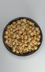 Filled and half hazelnuts on white background. Isolated