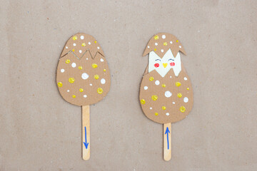 Step-by-step instructions for creating a funny toy Easter egg with cute chicken.
