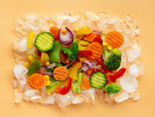 Fototapeta na wymiar Frozen vegetables on ice. Stocks of food. Healthy lifestyle. Flat lay. 