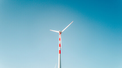 wind turbine against blue sky