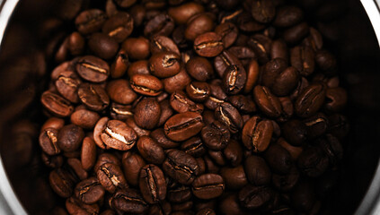 Close up of Coffee beans in a coffee jar. Food and drinks concept. Pattern