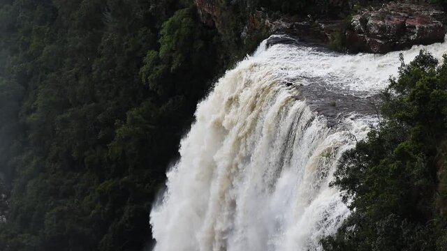 Static shot of the left side Lisbon Falls in the Lisbon Creek, Grasskop, South Africa. The highest (94m) waterfall in Mpumalanga, South africa. Filmed with a Canon 200D on a Tripod.
